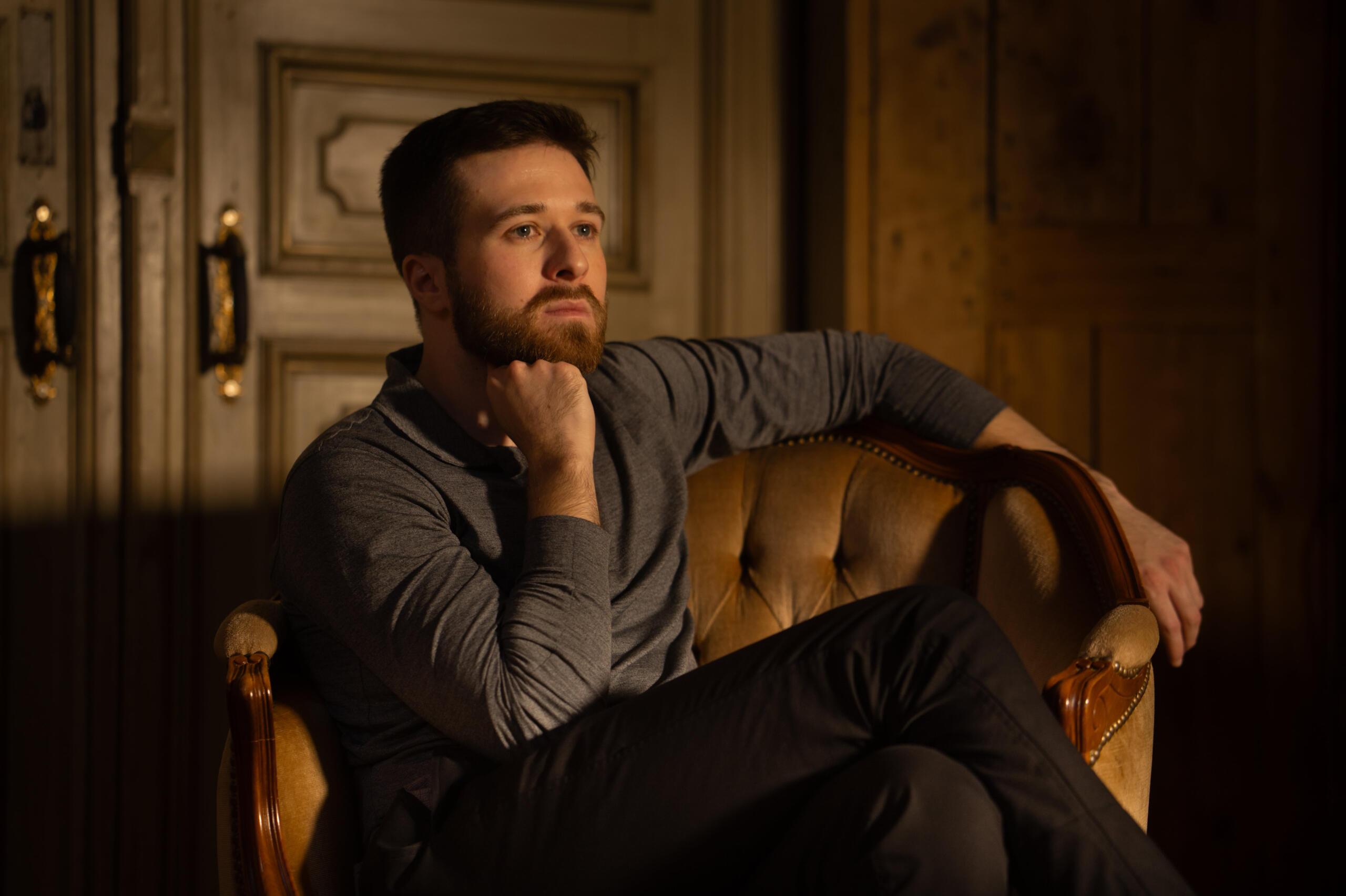 Alon Mor Alon Mor sitting on a chair